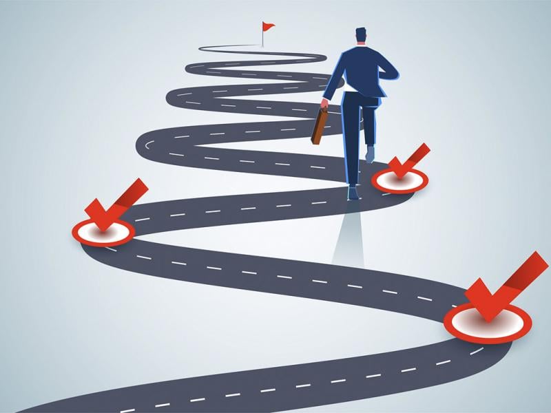 Figure advances up a winding road