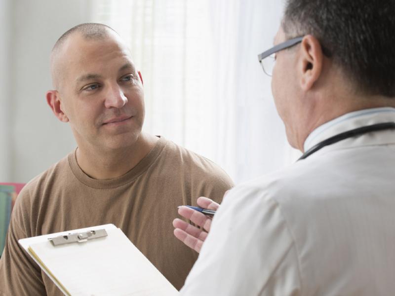 Patient listens to doctor during an appointment