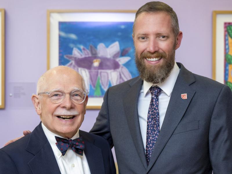 James Allison, MD, poses for a photo with Kyle Shelton, DO