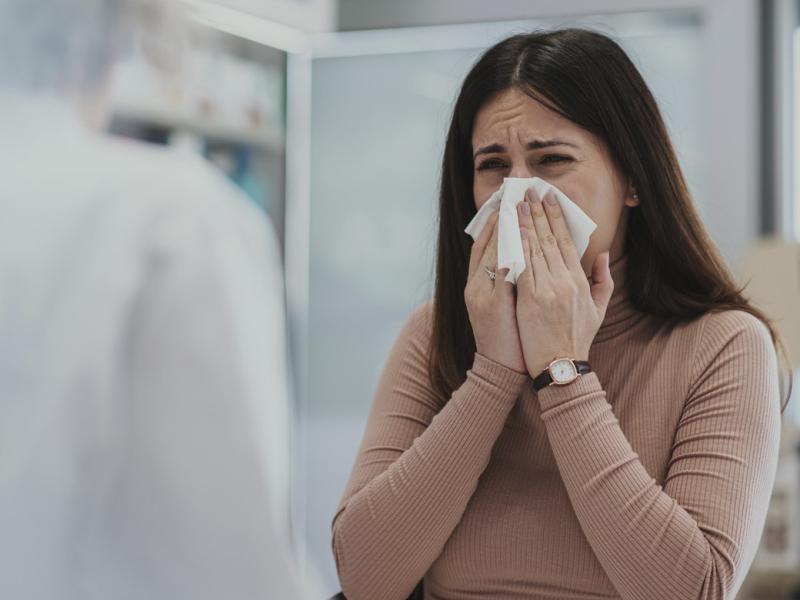 Patient holds facial tissue