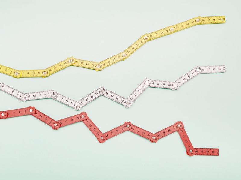 Folding rulers in shape of a stock curve