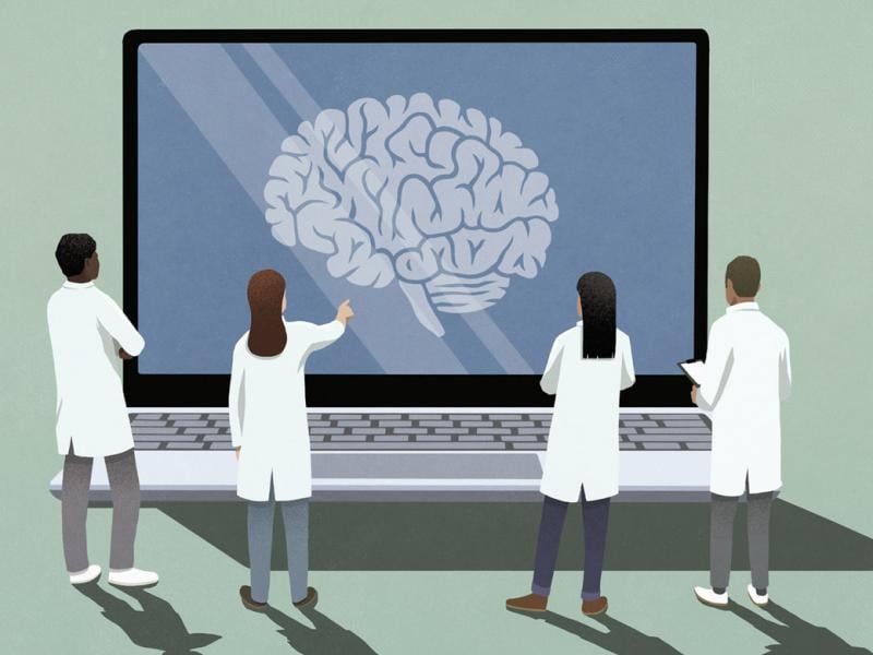 Figures stand in front of a large computer screen showing a human brain