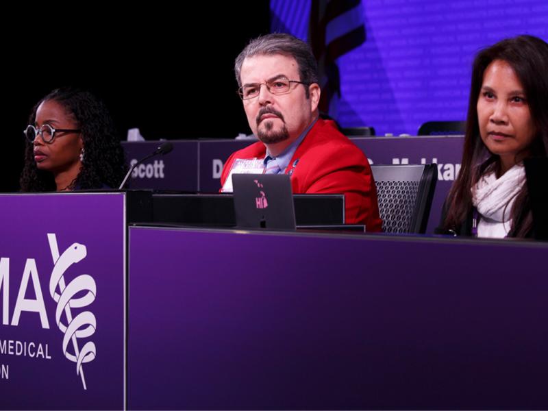 HOD members sitting in a committee discussion