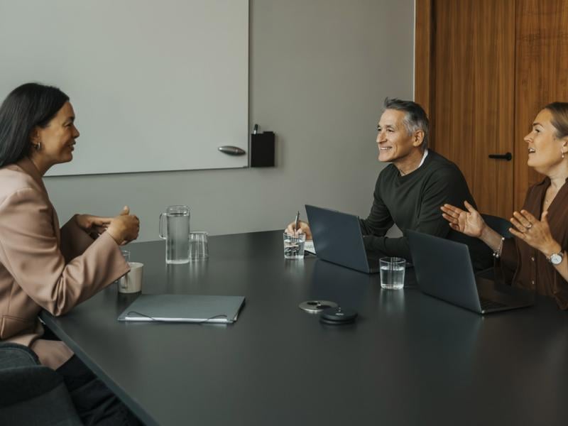 Interview taking place in office meeting room