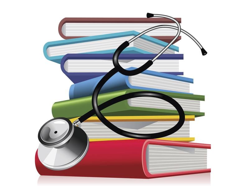 Stacked books and stethoscope