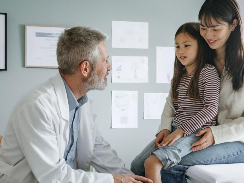 Young child and parent in a doctor's appointment