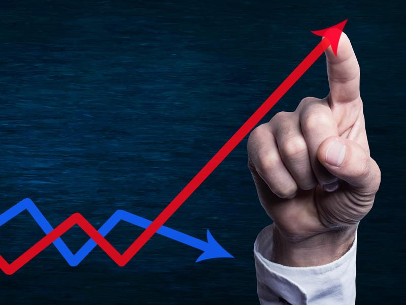 Finger traces upward trending graph