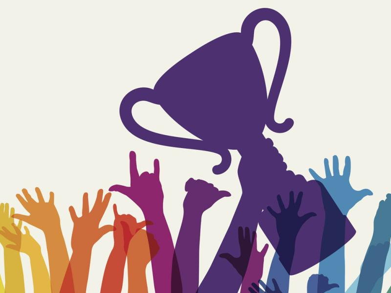 Raised hands with trophy