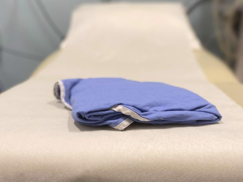Folded hospital gown