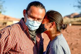 Couple wearing facemasks