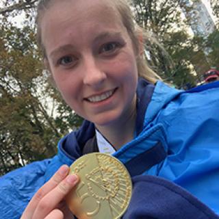 Whitney Stuard and marathon medal