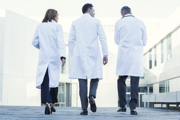 Medical professionals walking away