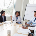 Medical professionals discussing a report