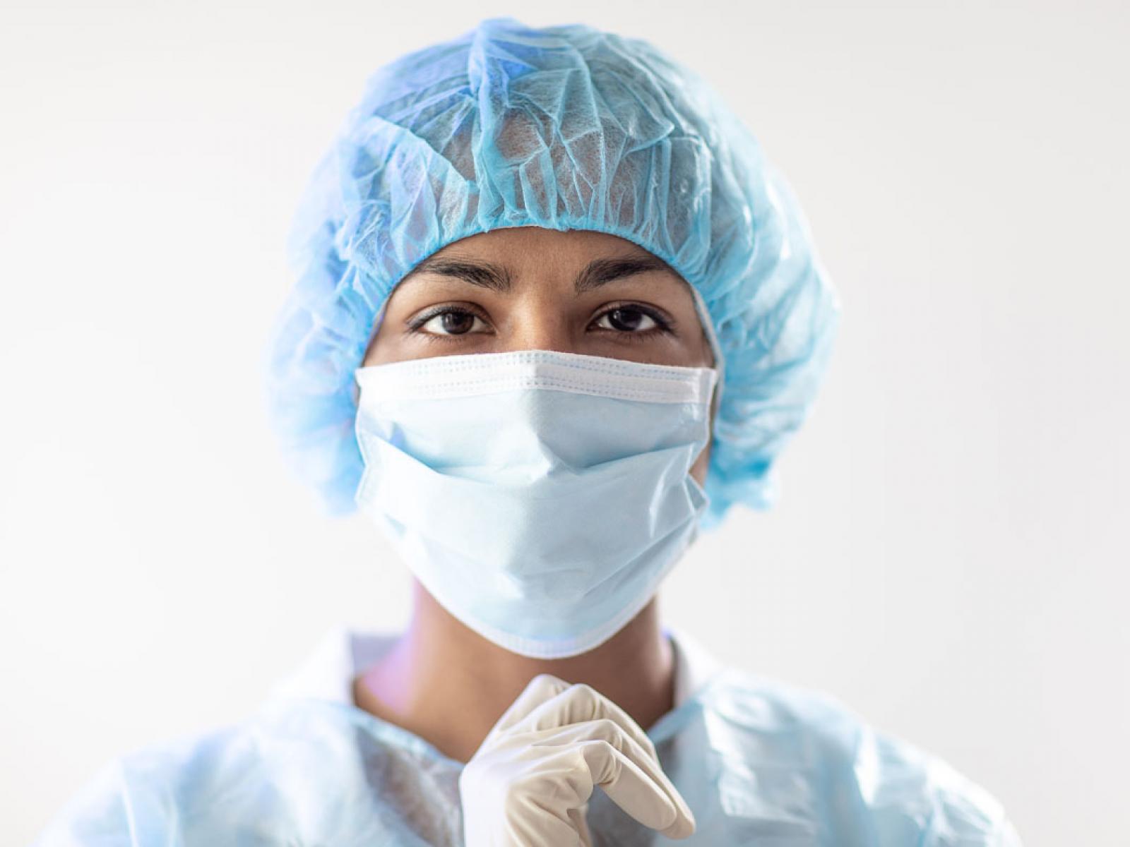 Health care professional wearing a face mask.