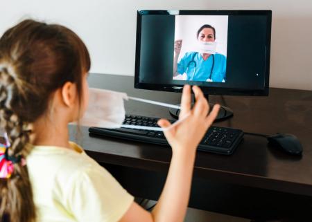 Young child in front of computer