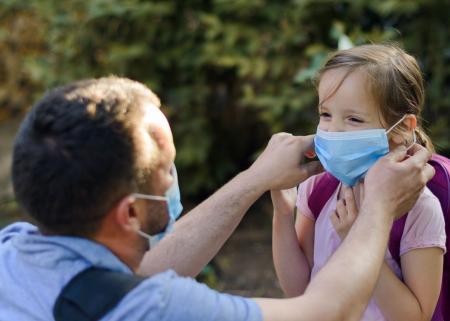 Young child wearing a face mask