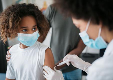 Young person receiving a vaccine