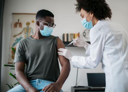 Person receiving vaccine