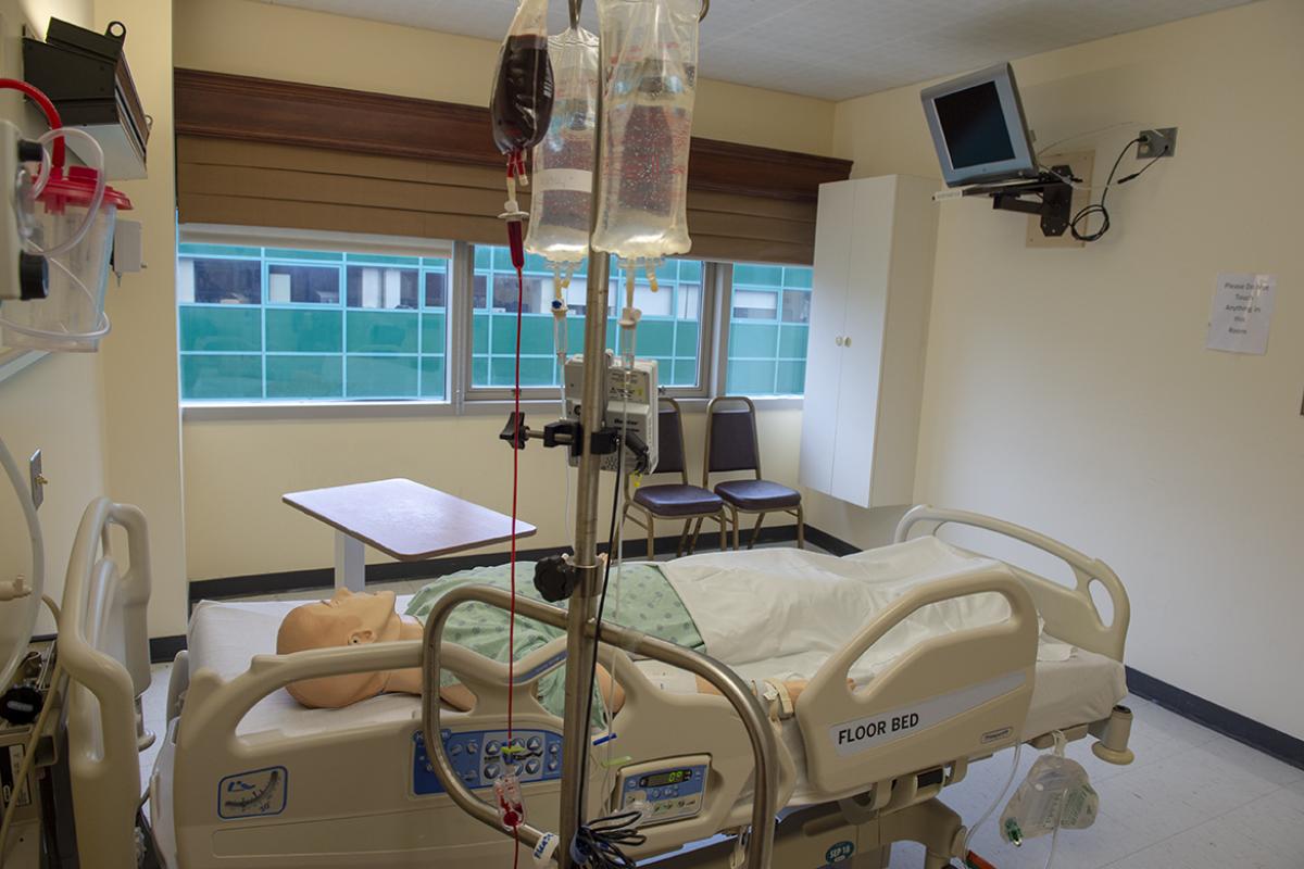 Setup of medical hazards in hospital room with test dummy
