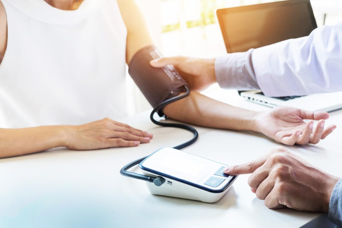 Patient getting blood pressure measurement