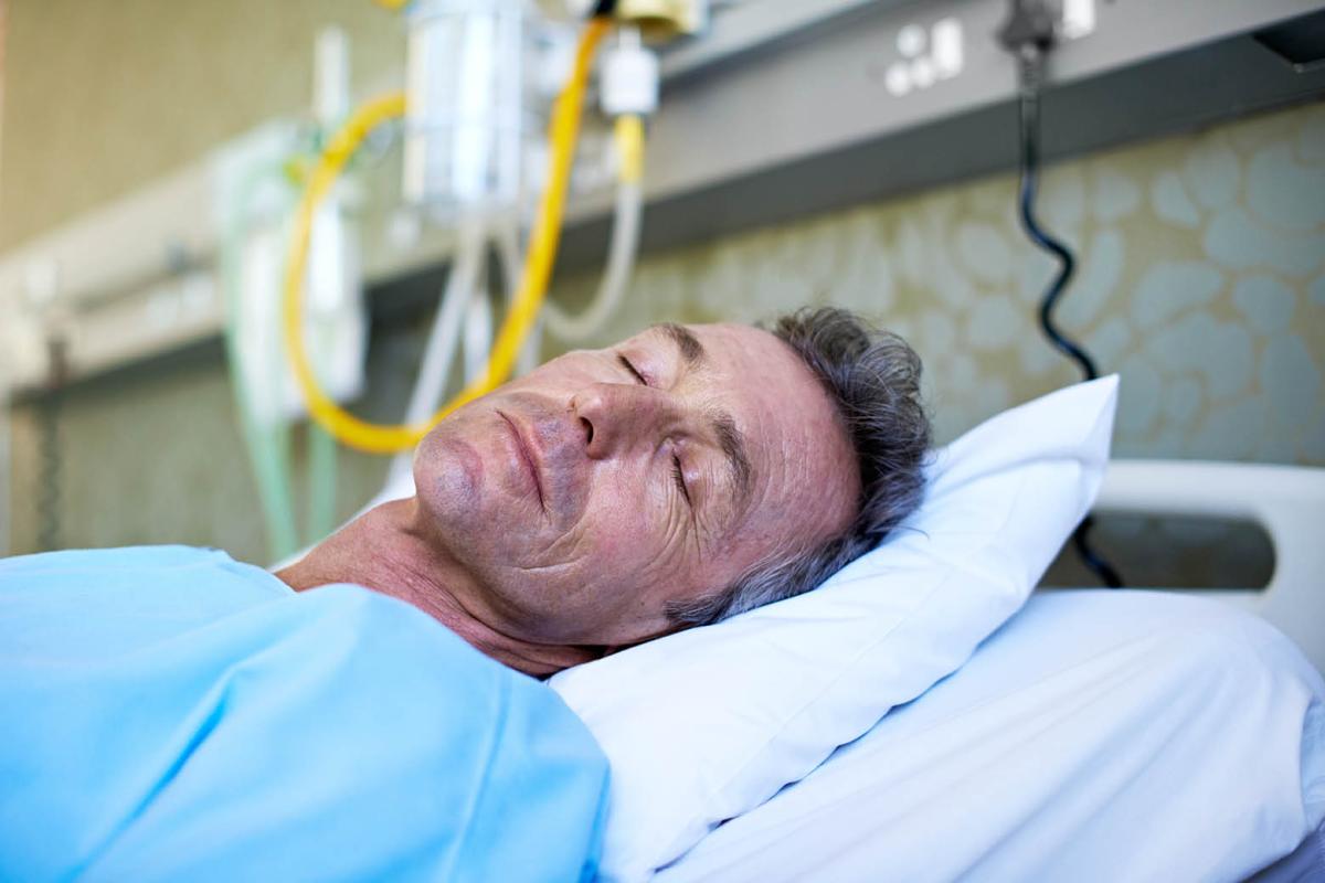 Man in a hospital bed