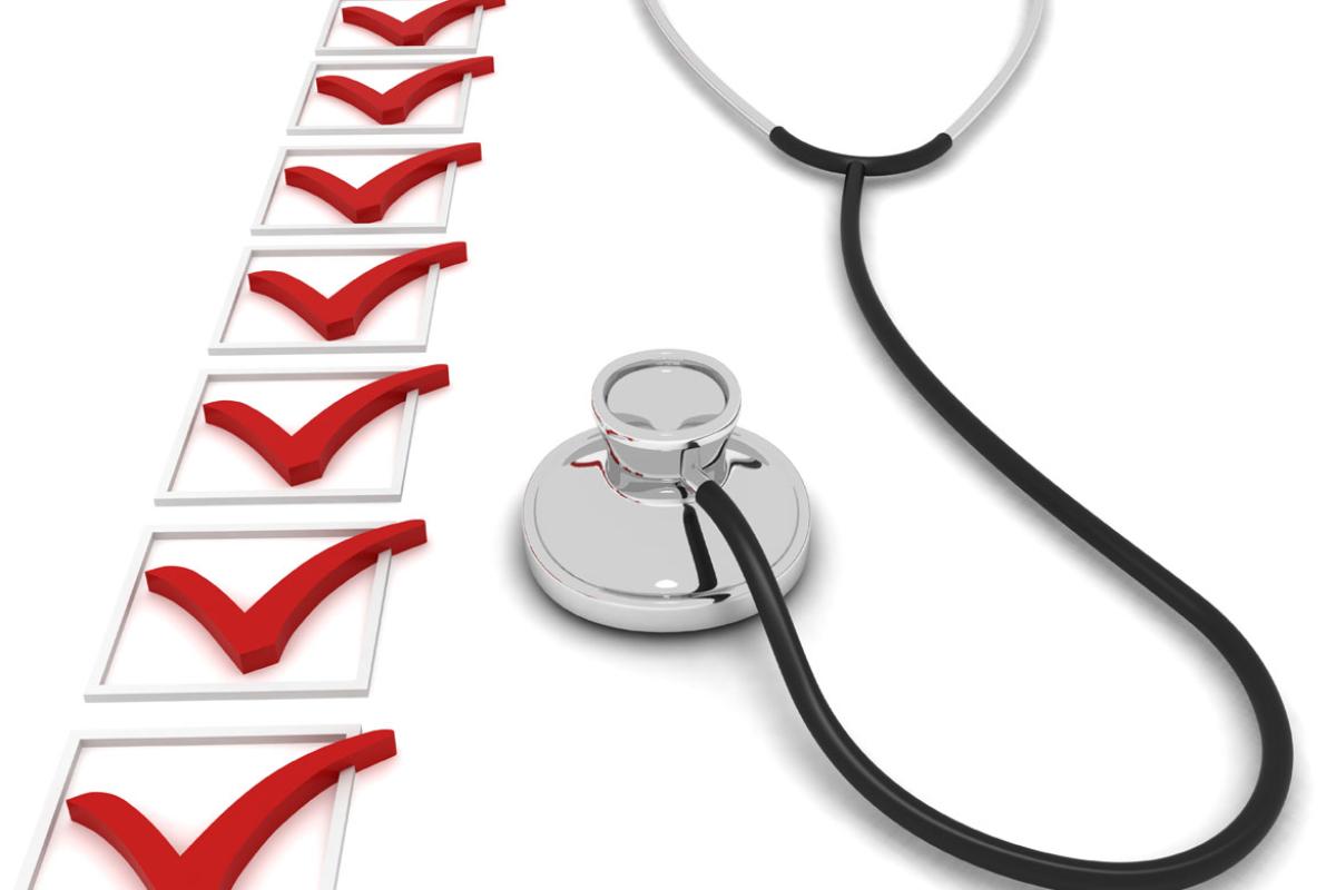 Stethoscope next to a line of checkboxes