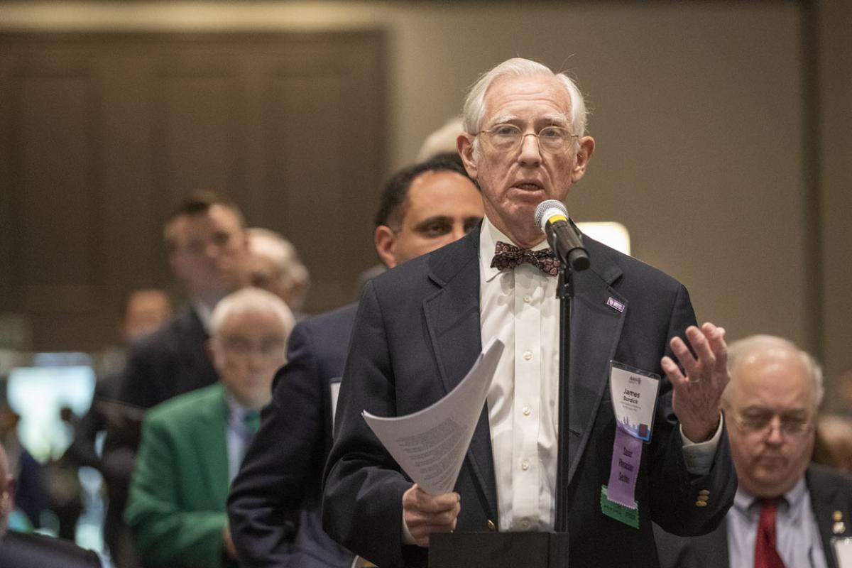 Delegate James Burdick, MD, speaking at 2019 HOD Interim Meeting.