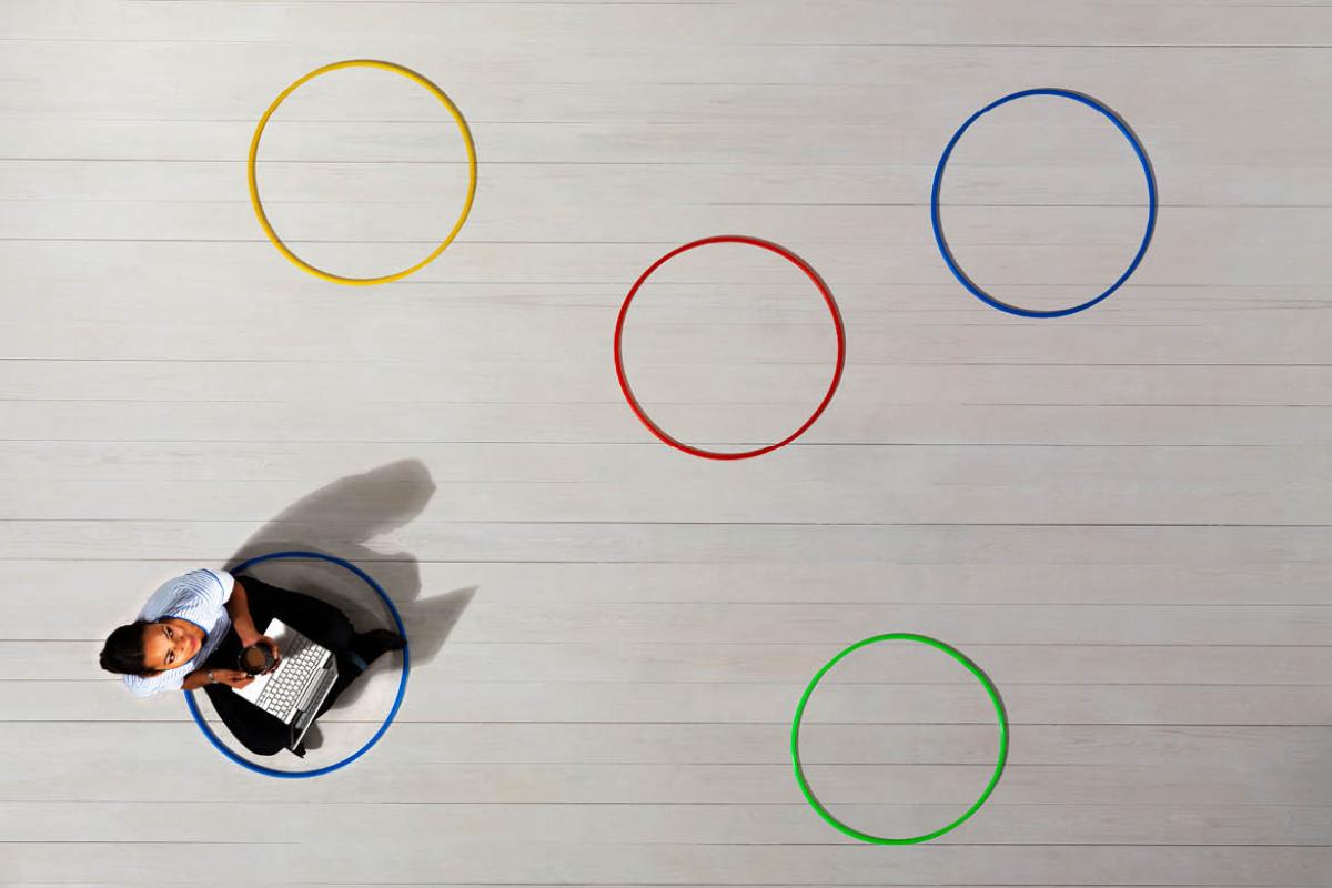 Woman surrounded by different colored circles