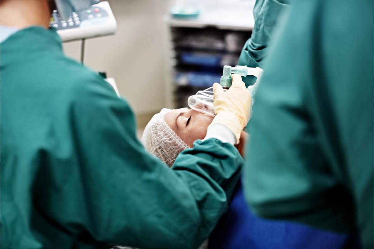 Patient being given anesthesia in operating room