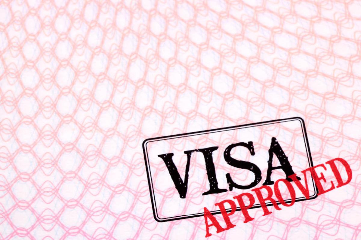 Visa with the word "Approved" in red