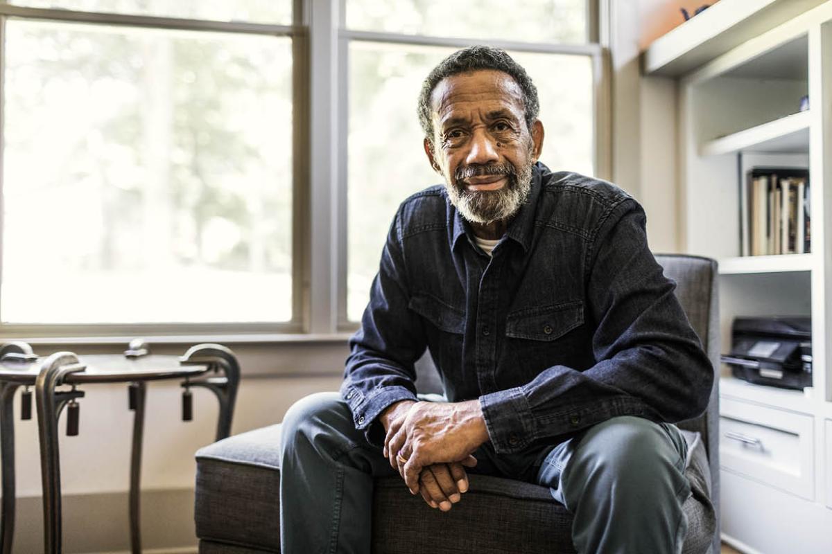Man sitting on chair looking ahead