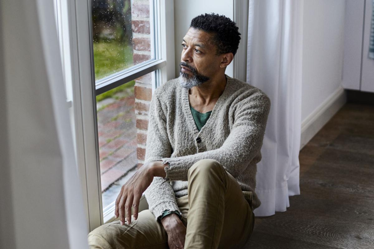 Person looking out a window