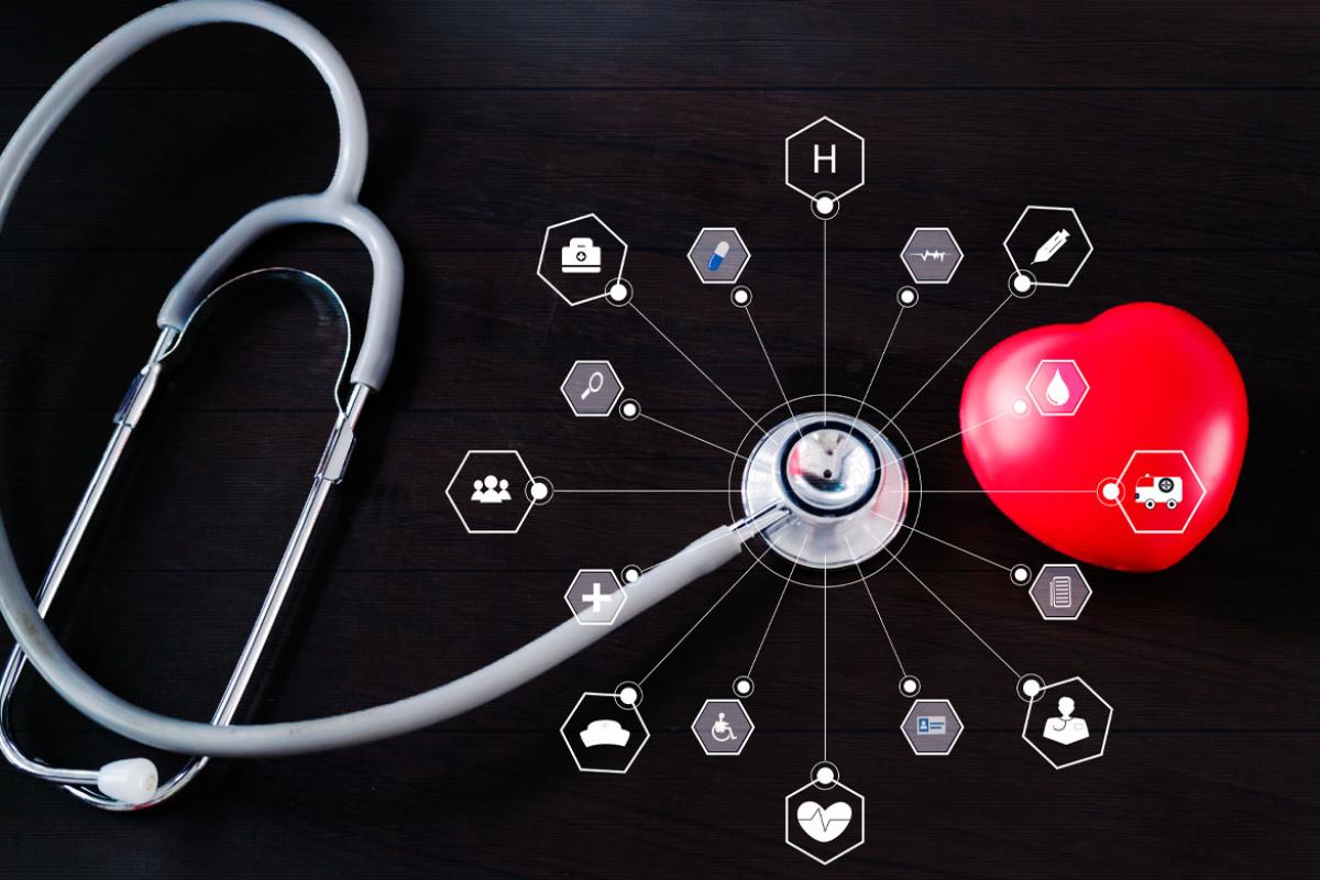Stethoscope with red heart and icon medical network connection.
