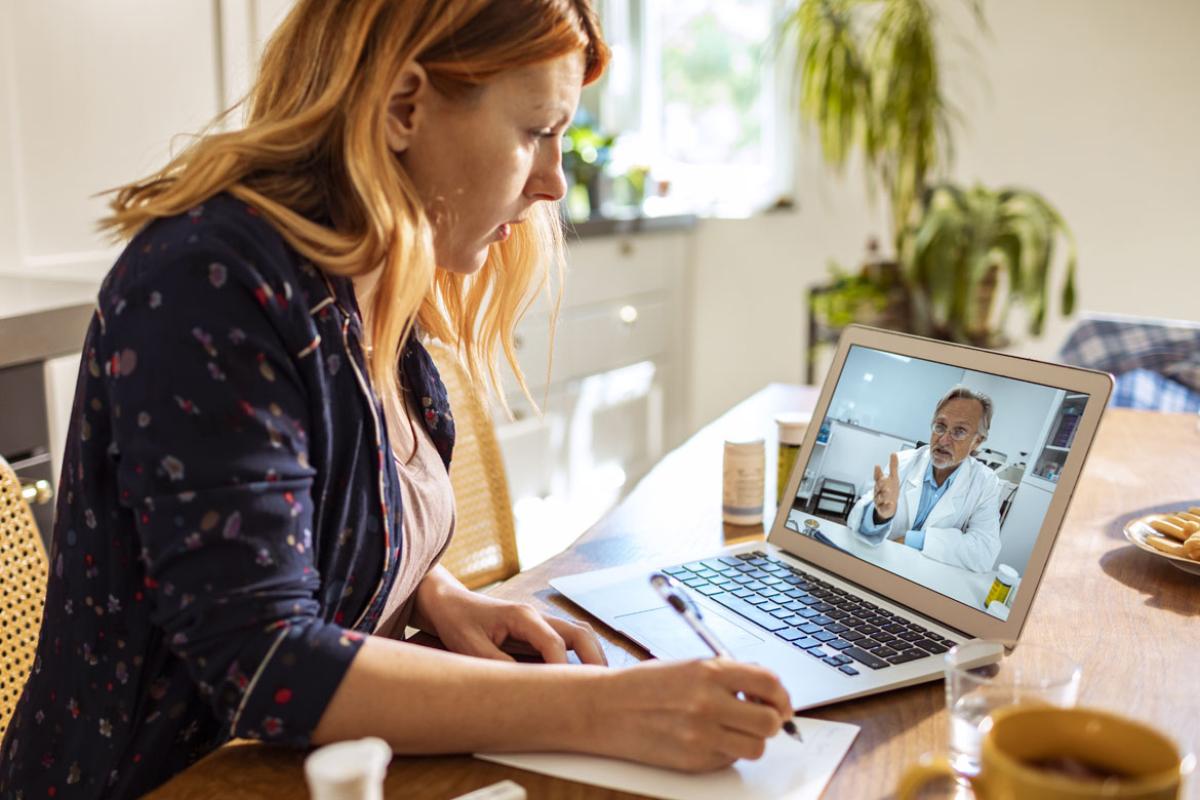 Patient and physician in a telehealth appointment