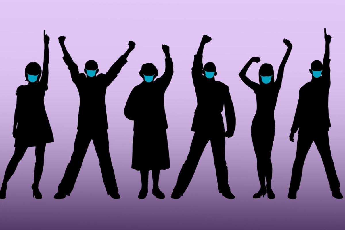 Figures wearing face masks