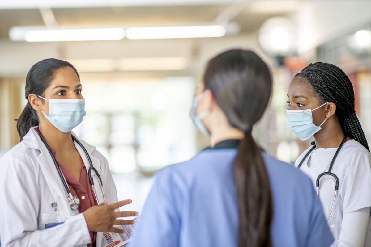 Health care workers speaking
