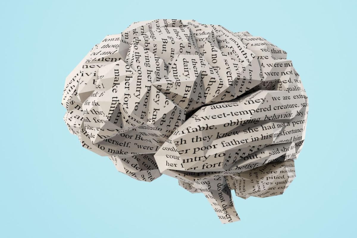 Photo illustration of a human brain made from crumpled up paper.
