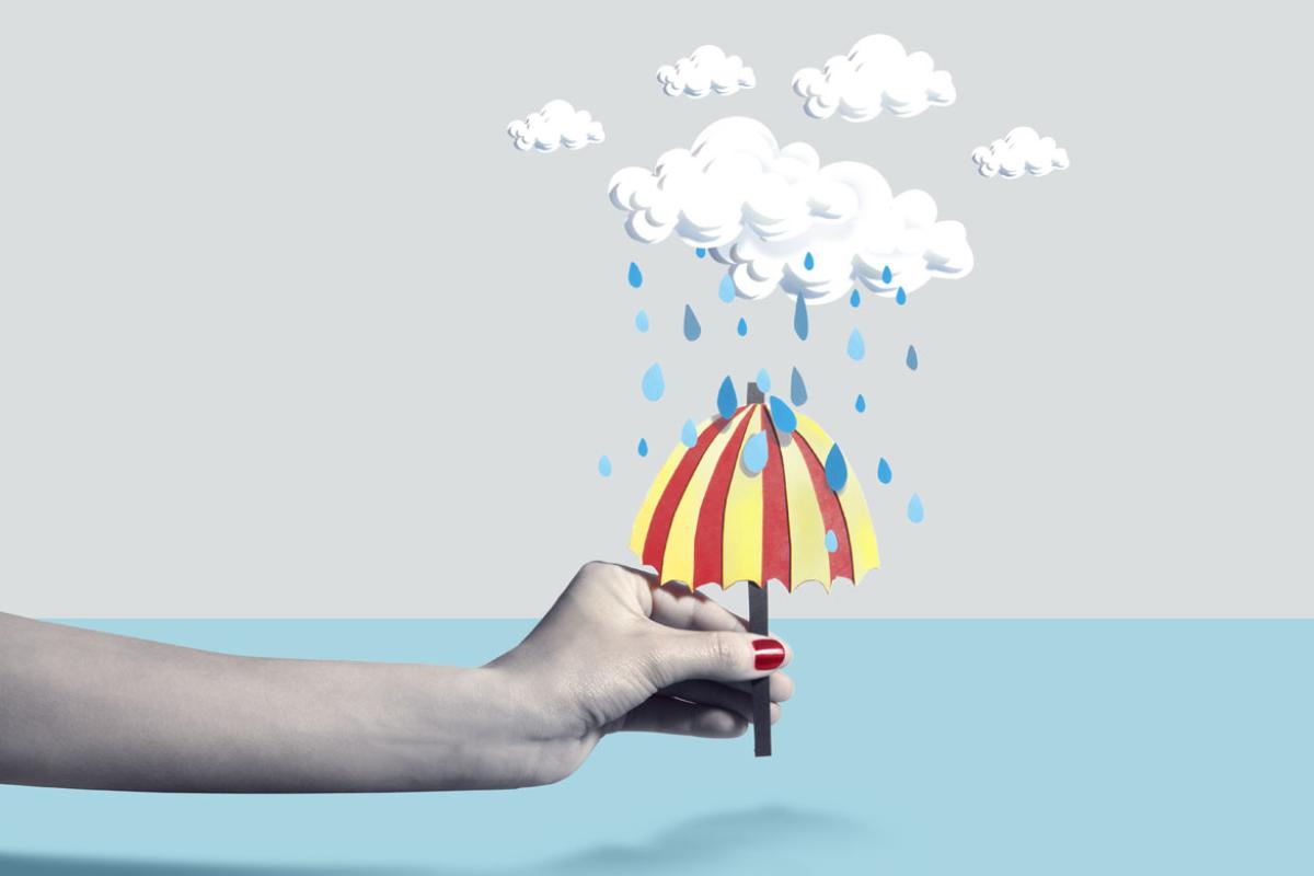 Woman holding 3D illustration of rain clouds and umbrella