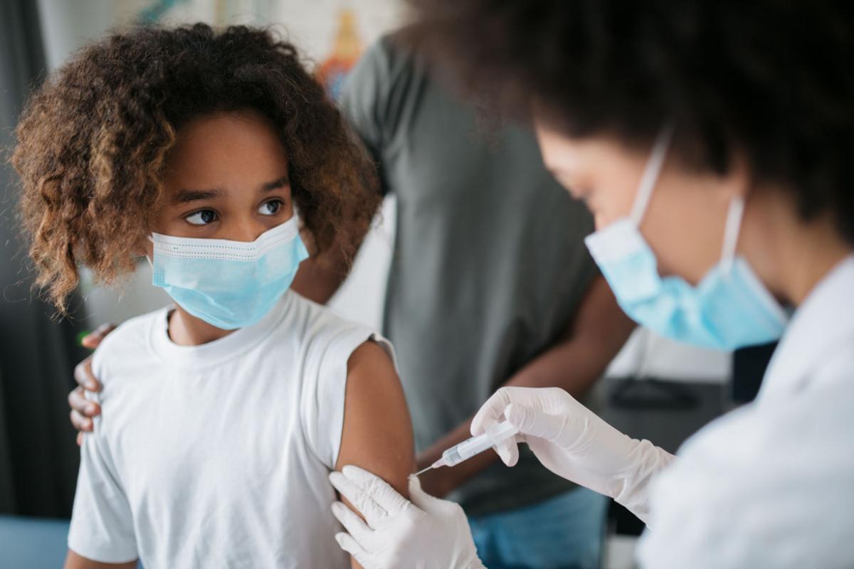 Young person receiving a vaccine