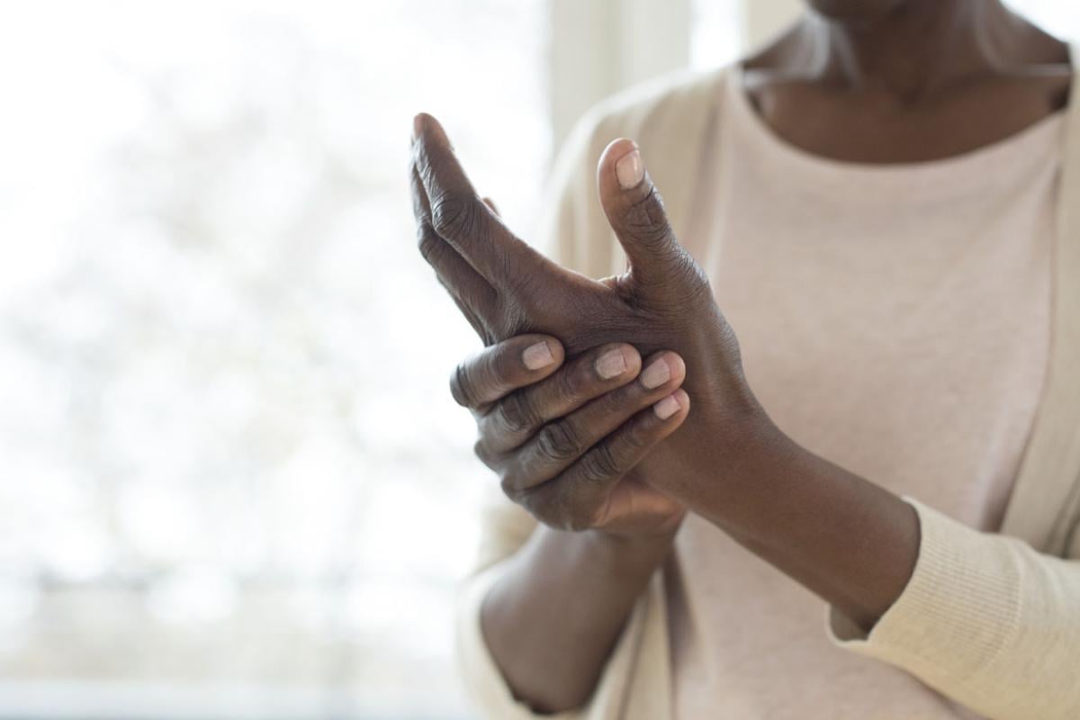 Close-up of an African-American woman's hands.
