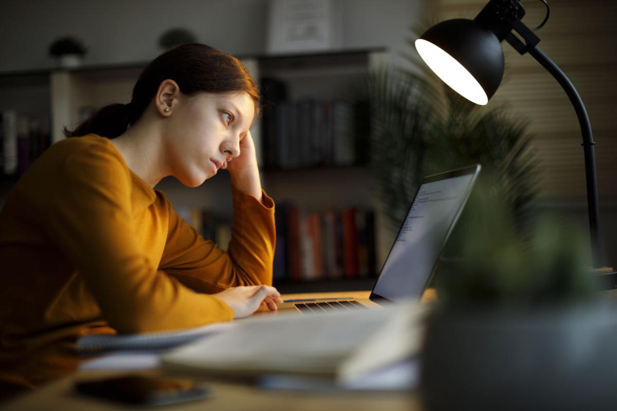 Person looking at a laptop