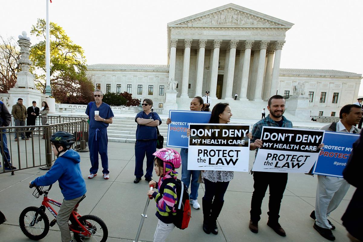 People in front of the U.S. Supreme Court building