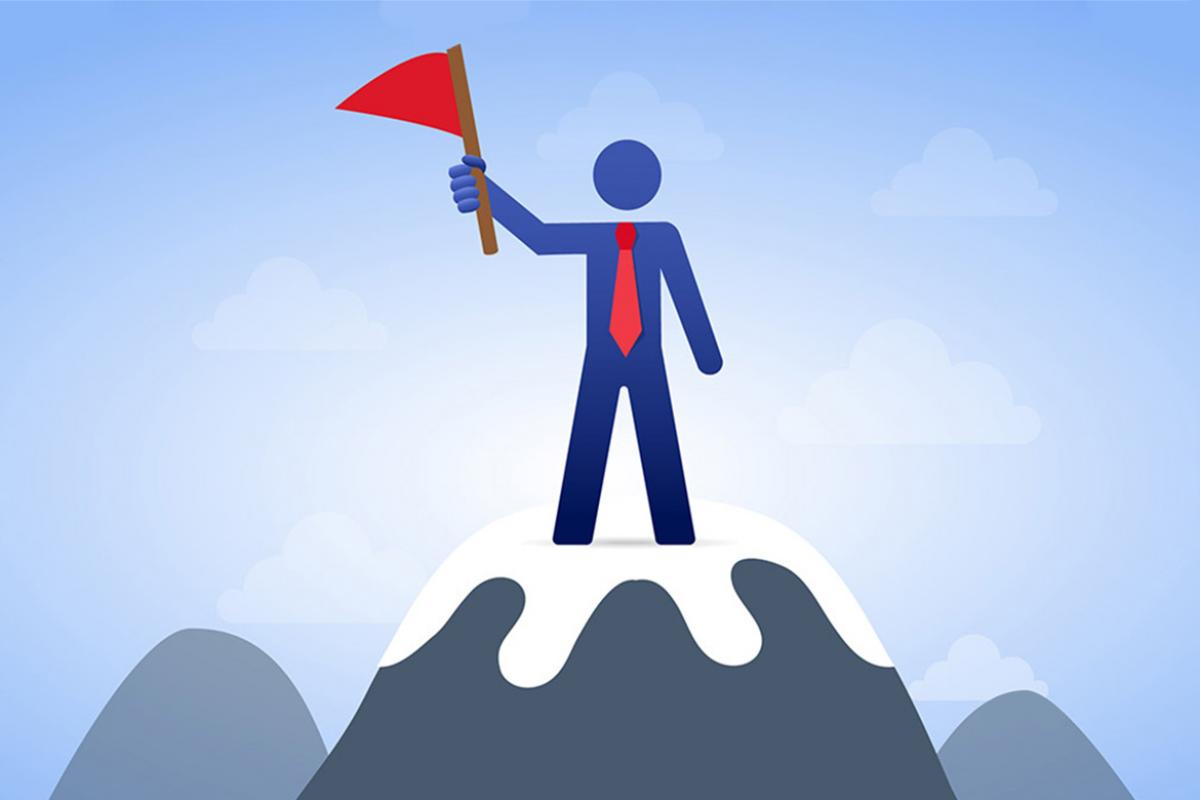 Illustration of a figure holding a red flag, and standing on top of a snow capped peak