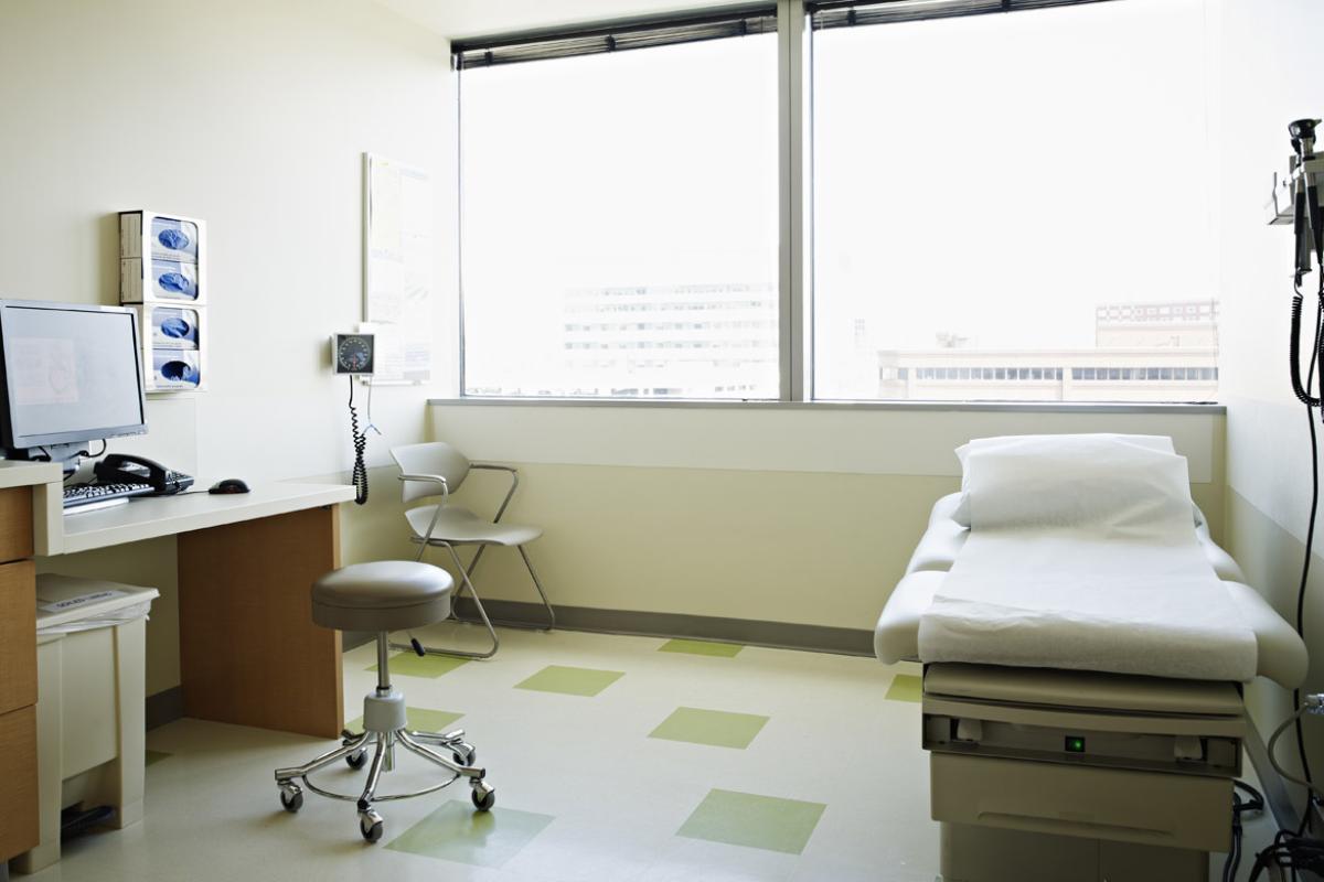 Empty patient medical examining room