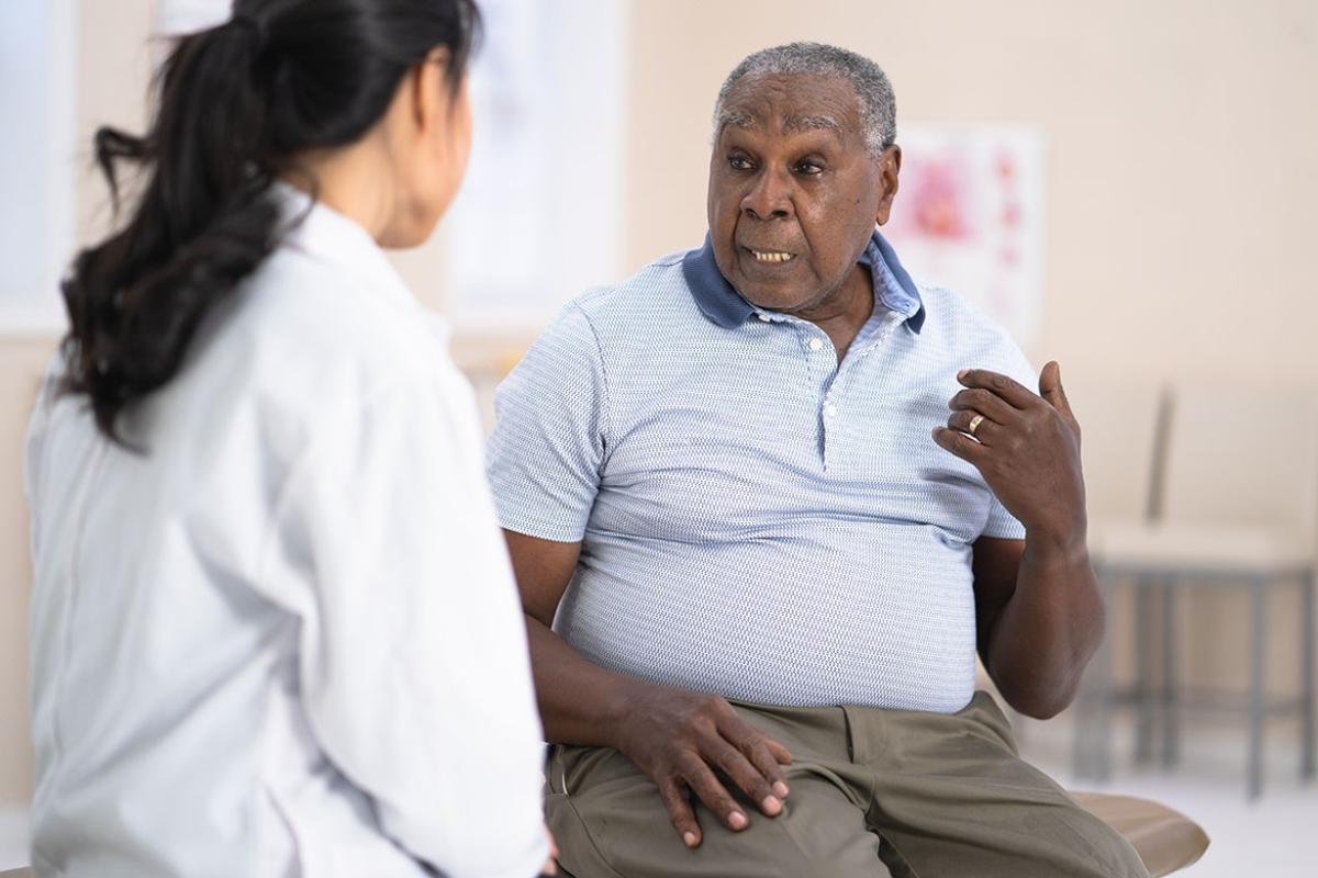 Patient speaking to physician