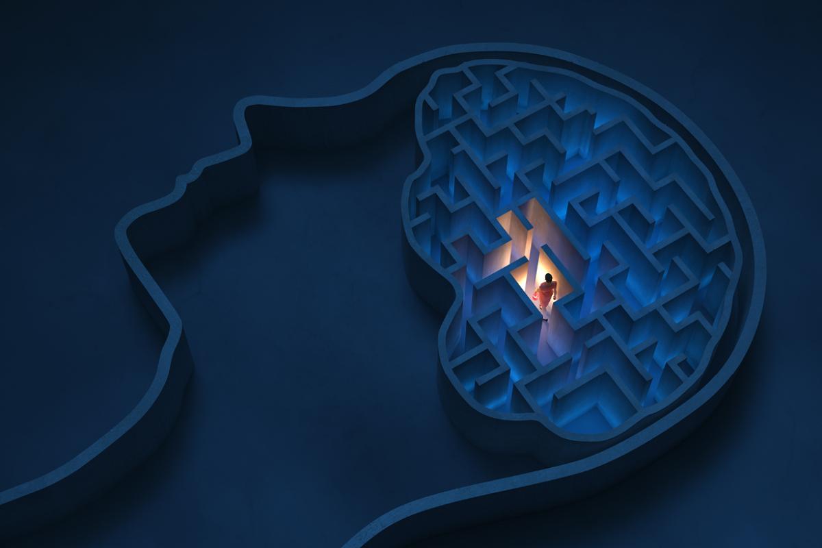 Figure in a maze-shaped human brain