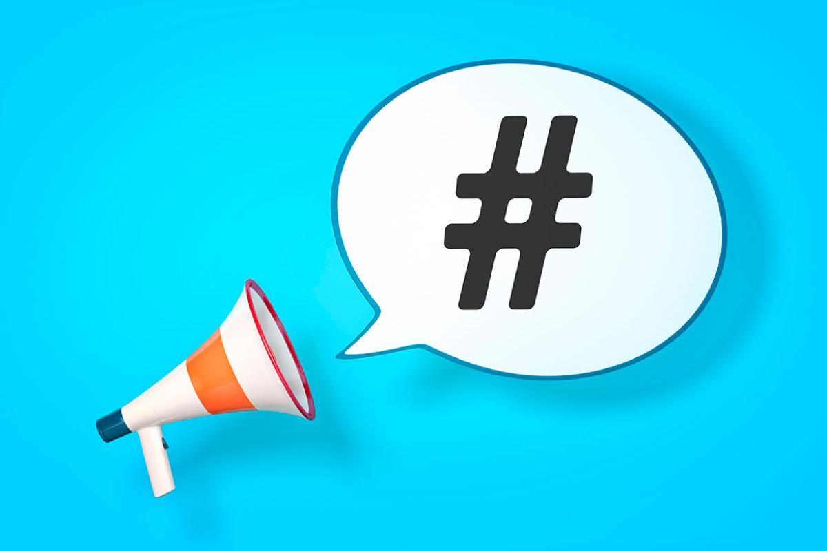  Speech bubble with hashtag by megaphone