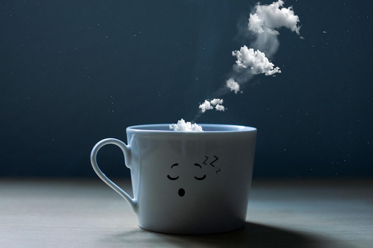 Smoke and white clouds come out of a mug
