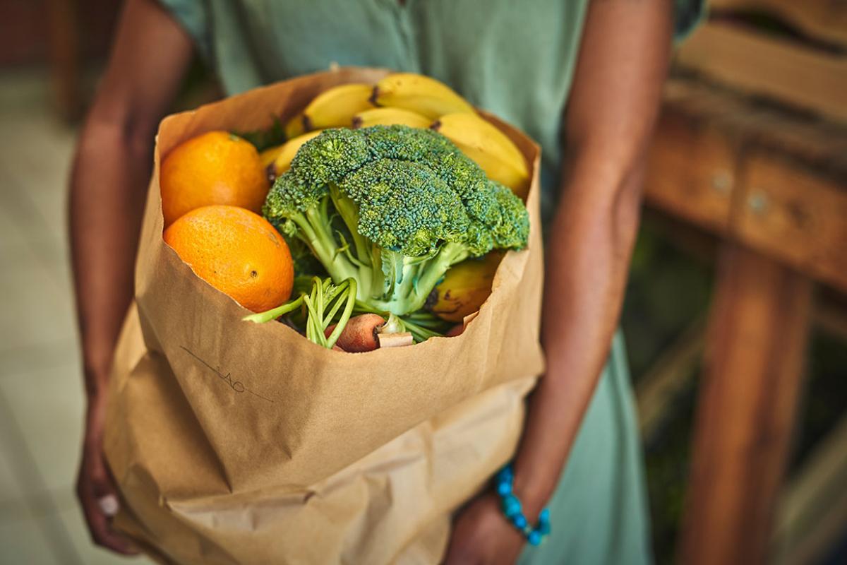 Grocery bag filled with fruit and vegetables