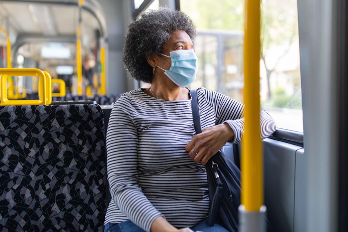 African-American woman on public transportation
